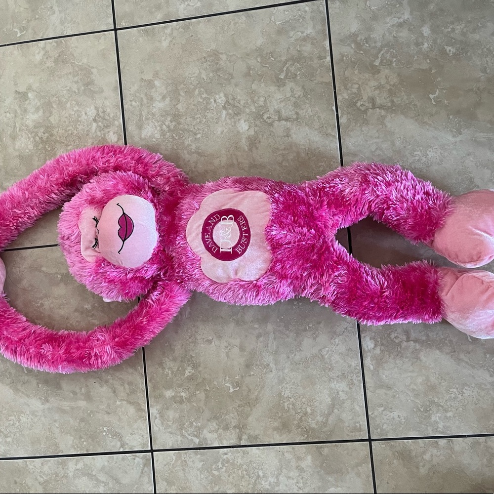 Dave & Buster’s pink monkey